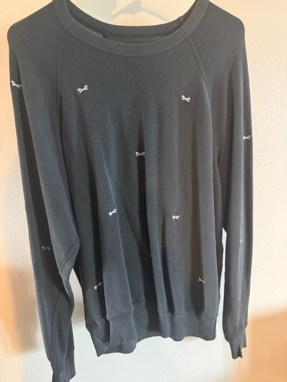 THE GREAT. Black Sweatshirt with Small White Bow Embroidery